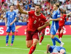 IM体育官网-瑞士队在比赛中表现出勇气与拼搏精神